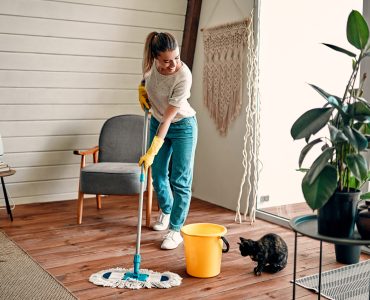 woman deep cleaning at home